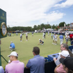 Fans watch the play on the practice green during a practice round ahead of the 2024 U.S. Open at Pinehurst. (Logan Whitton/USGA)