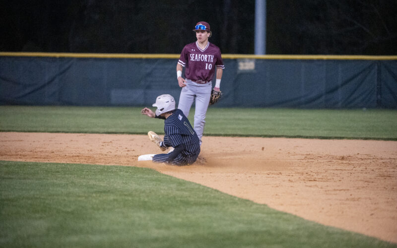 North Moore’s Austin Patterson steals second base against Seaforth during an April game. Baseball was the one high school sport that saw a decrease in participation in North Carolina this year. PJ WARD-BROWN/NORTH STATE JOURNAL