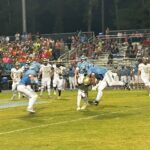 Union Pines' sophomore linebacker Josiah Sandler (7) makes a tackle in the Vikings' 35-0 win. Sandler had one of the Vikings' seven interceptions. (Asheebo Rojas / Chatham News & Record)