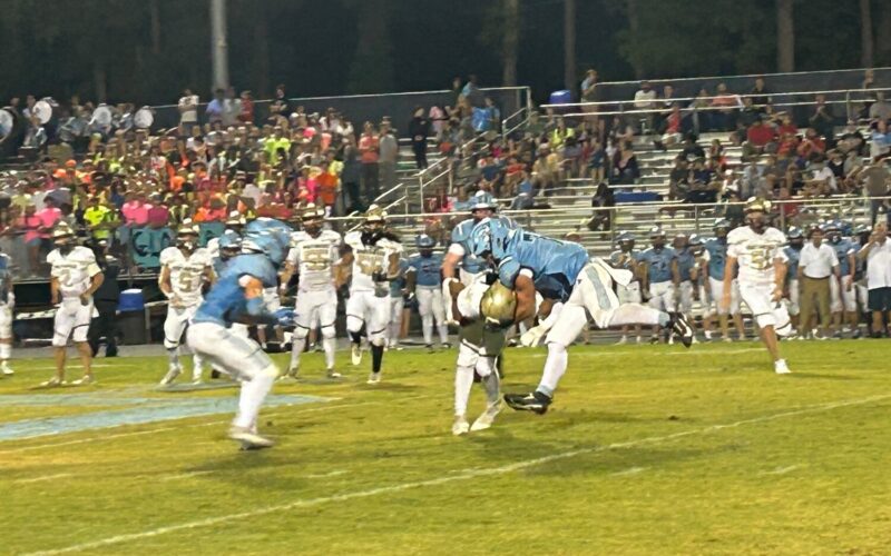 Union Pines' sophomore linebacker Josiah Sandler (7) makes a tackle in the Vikings' 35-0 win. Sandler had one of the Vikings' seven interceptions. (Asheebo Rojas / Chatham News & Record)