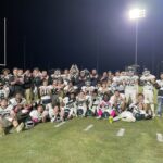 After winning and spoiling Seaforth’s homecoming, North Moore posed for a team photo on the Hawks’ field before heading back home. (North Moore Mustangs’ Twitter/X account)