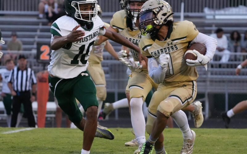 North Moore junior defensive back Justin Walker (10) tries to get a stop on Northwood’s Raje Torres during Friday’s game. Walker finished with five tackles, two tackles for loss and a pass defense in the Mustangs’ loss. (Gene Galin for North State Journal)